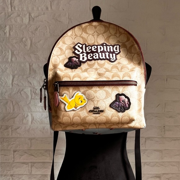 Disney X Coach Medium Charlie Backpack In Signature Canvas With Sleeping Beauty - Picture 1 of 17